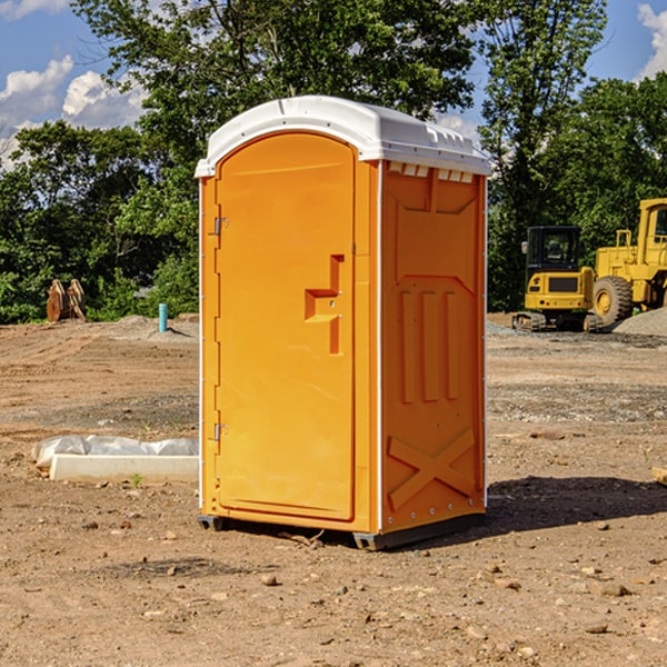 how often are the porta potties cleaned and serviced during a rental period in Woxall